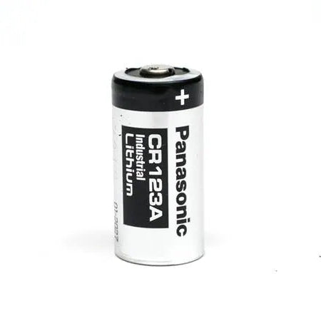 A single Panasonic CR123A industrial lithium battery standing upright on a white background.